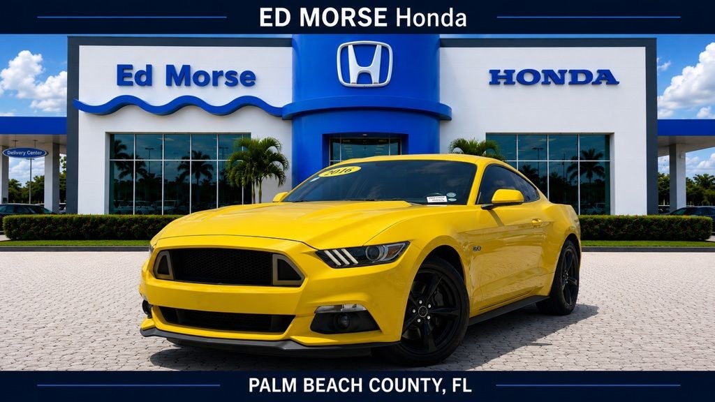 2016 Ford Mustang GT in Yellow — front three-quarter view