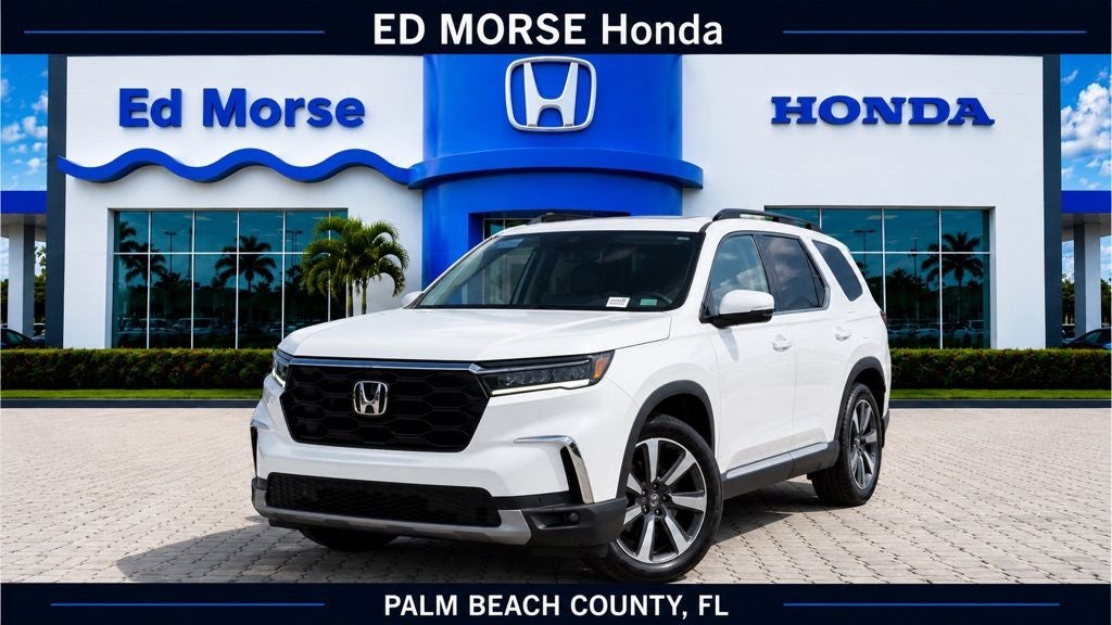 2024 Honda Pilot Touring in Platinum White Pearl — front three-quarter view