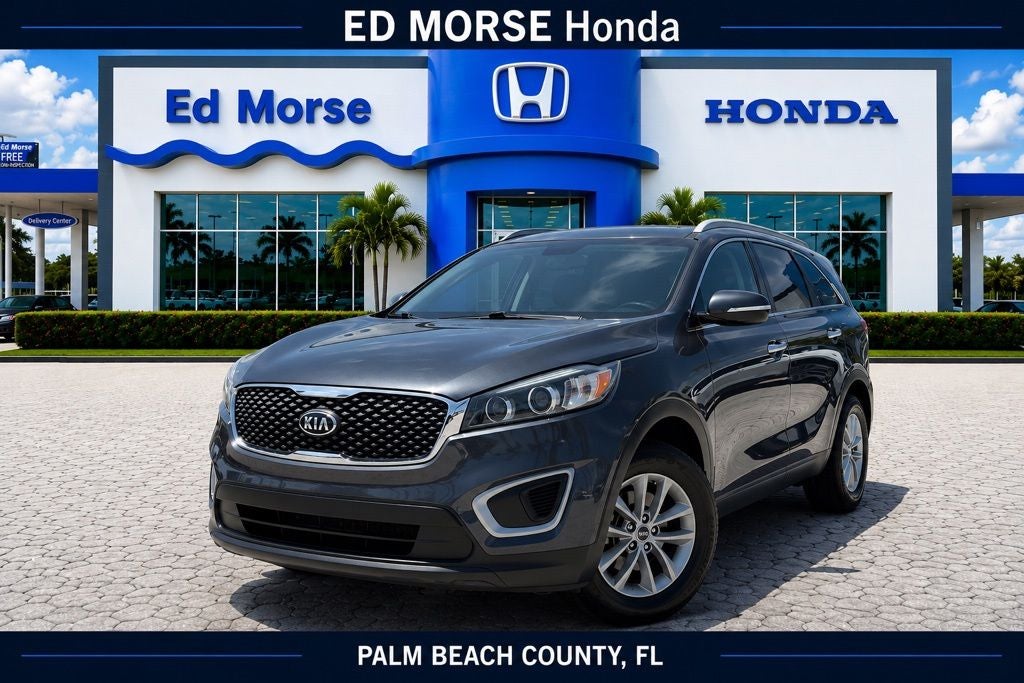 2018 Kia Sorento LX in Platinum Graphite — front three-quarter view